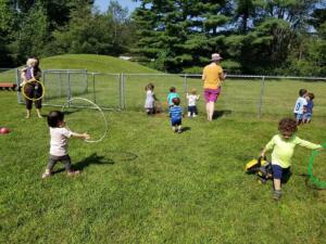 YCC students playing outside in the yard